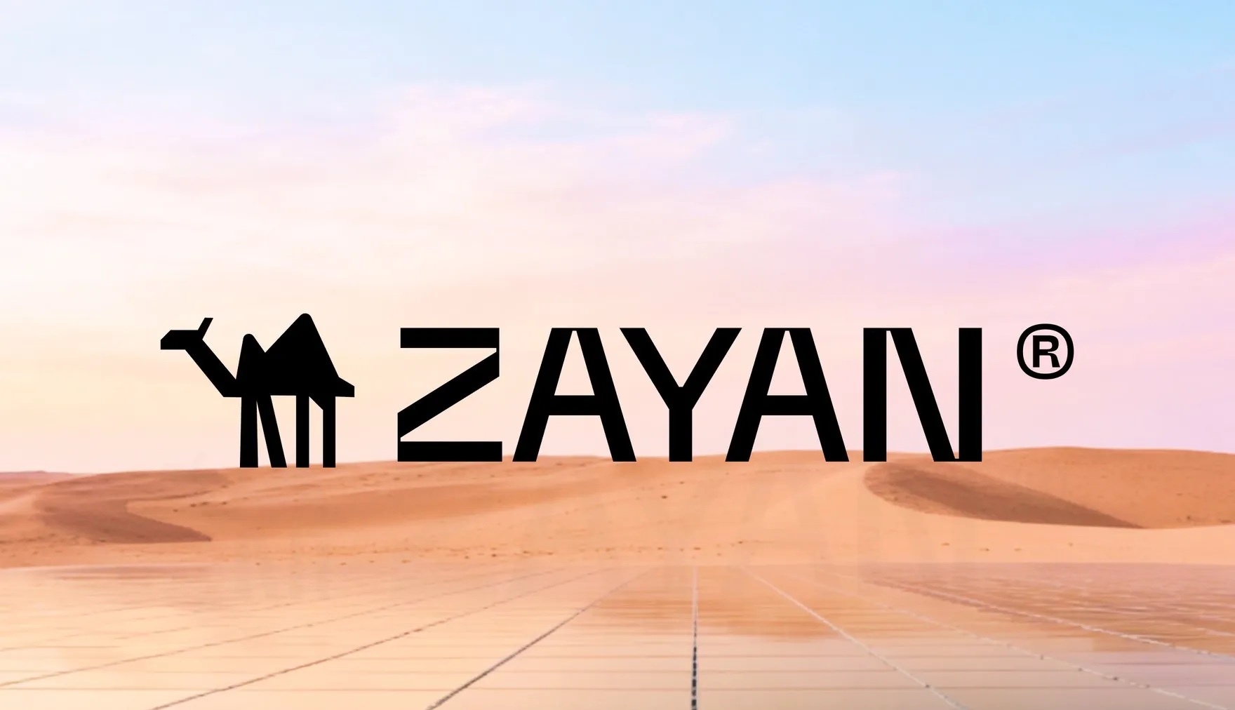 Zayan brand logo over a desert landscape
