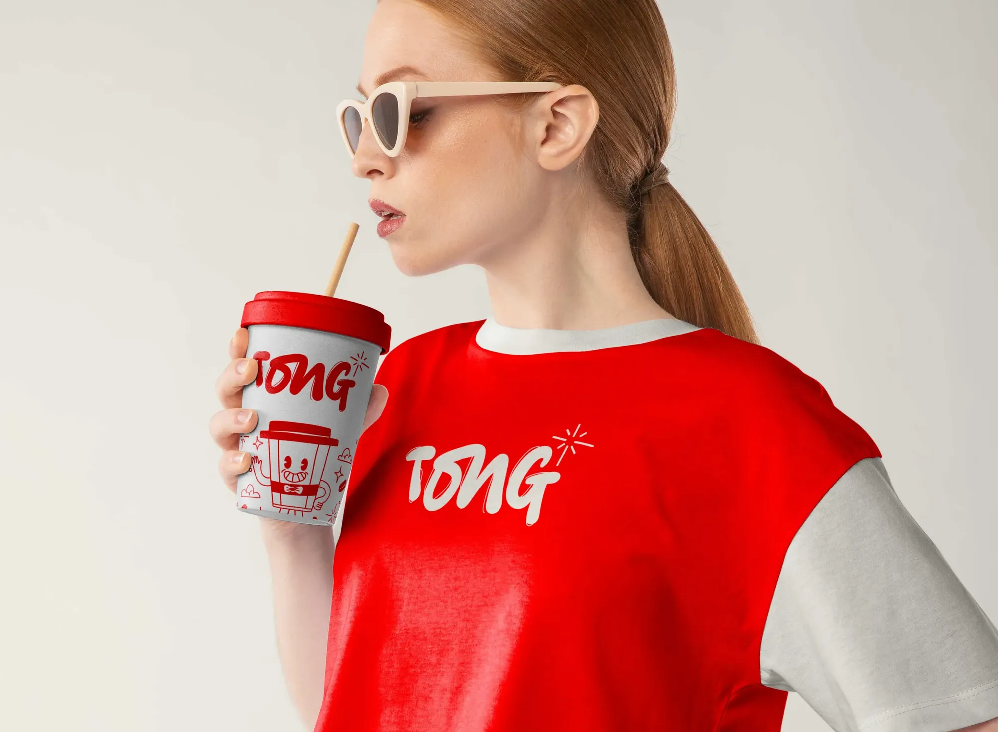 Tong brand campaign with a model holding a branded cup