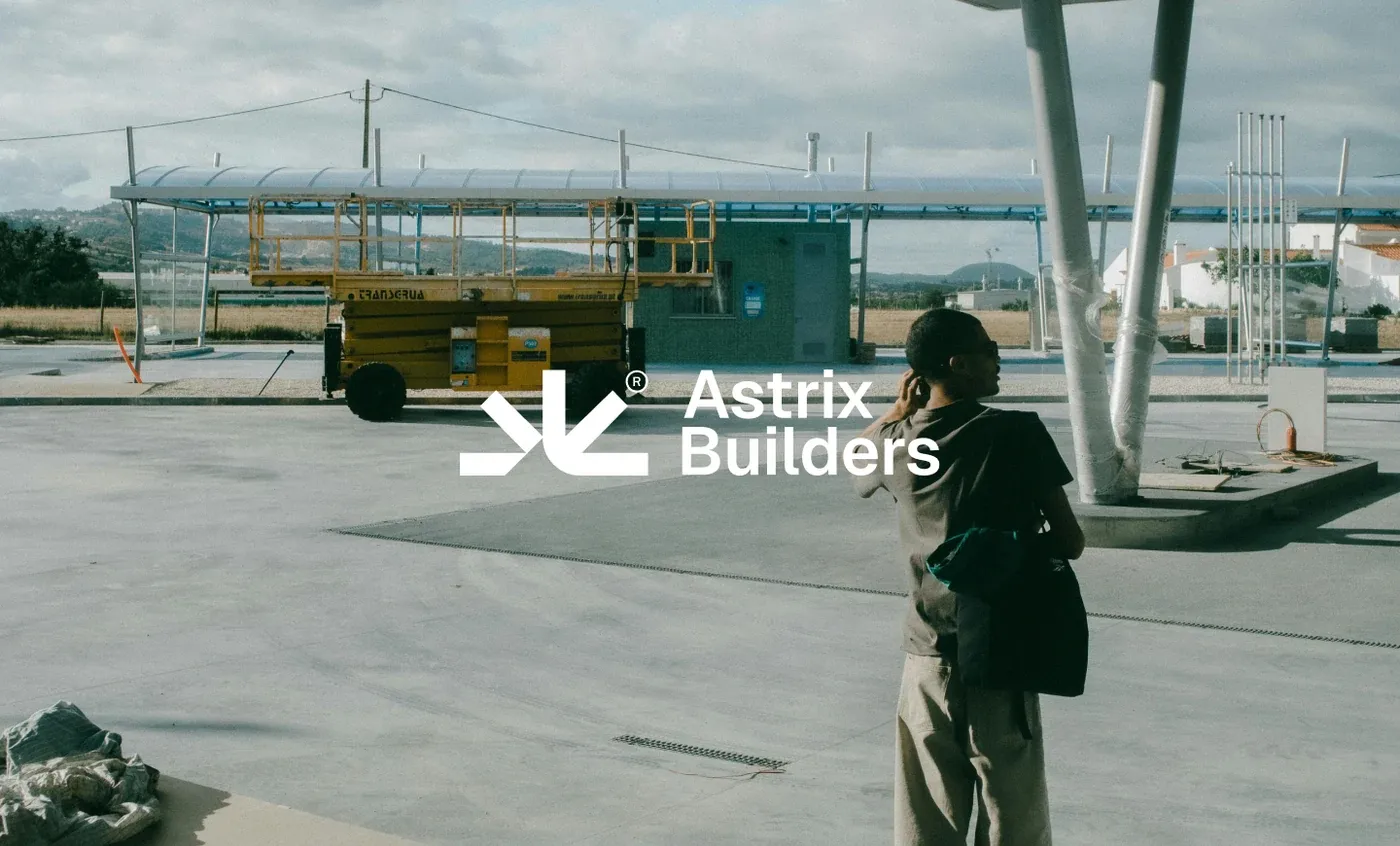 Astrix Builders identity by Wolfpixel, showing a geometric white symbol beside the stacked Astrix Builders name.