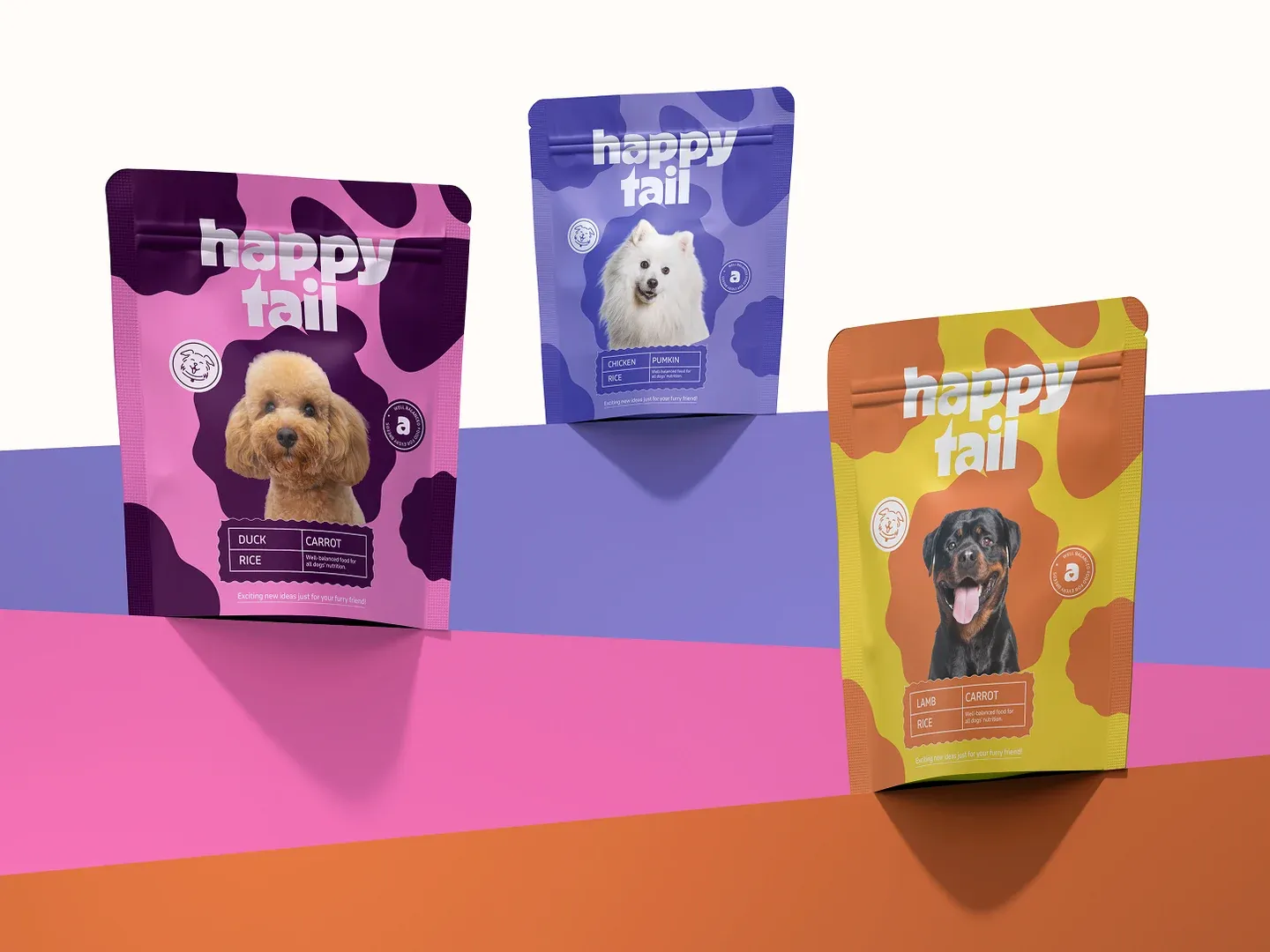 Happy Tail pet food packaging by Wolfpixel, using a consistent white wordmark and graphic pattern across three colorful pouches.