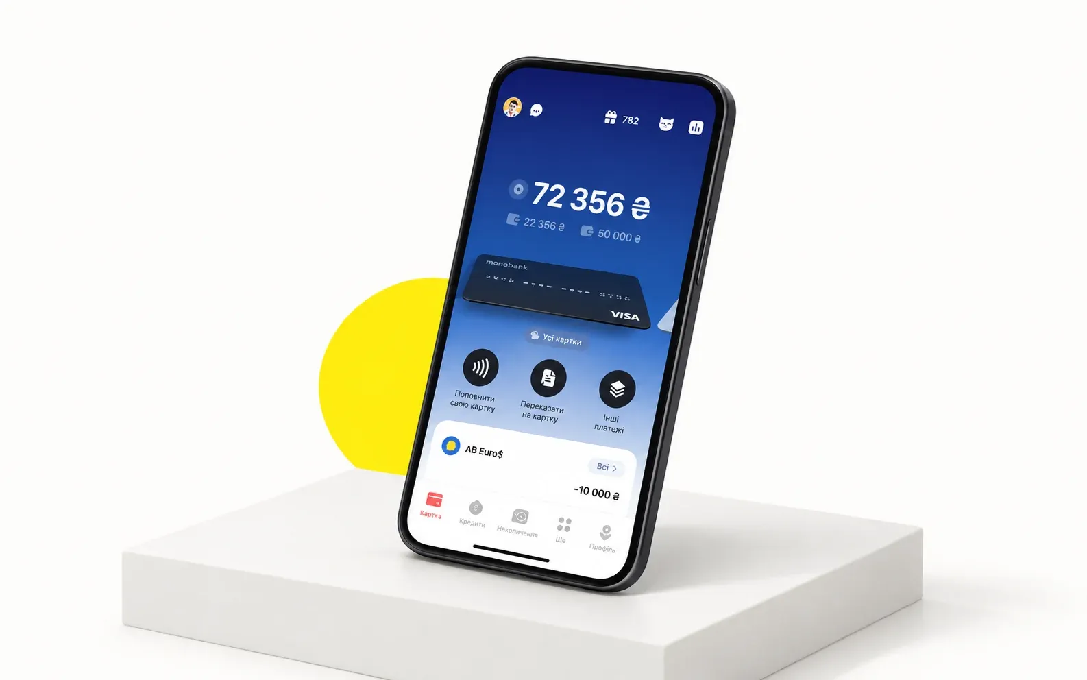 monobank interface adapted into a charcoal phone mockup on a light studio background with a Wolfpixel yellow accent