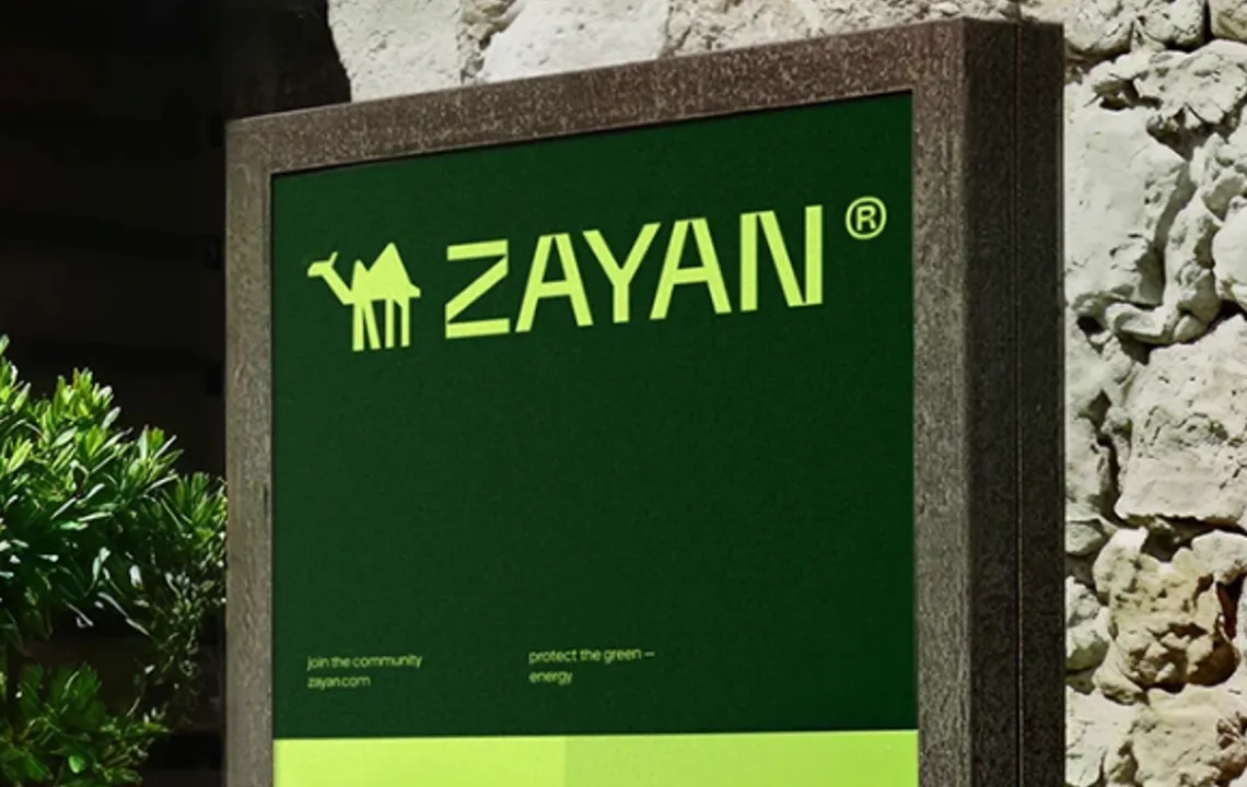 Zayan brand sign on a stone wall