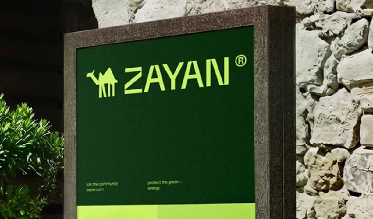 Zayan brand sign on a stone wall