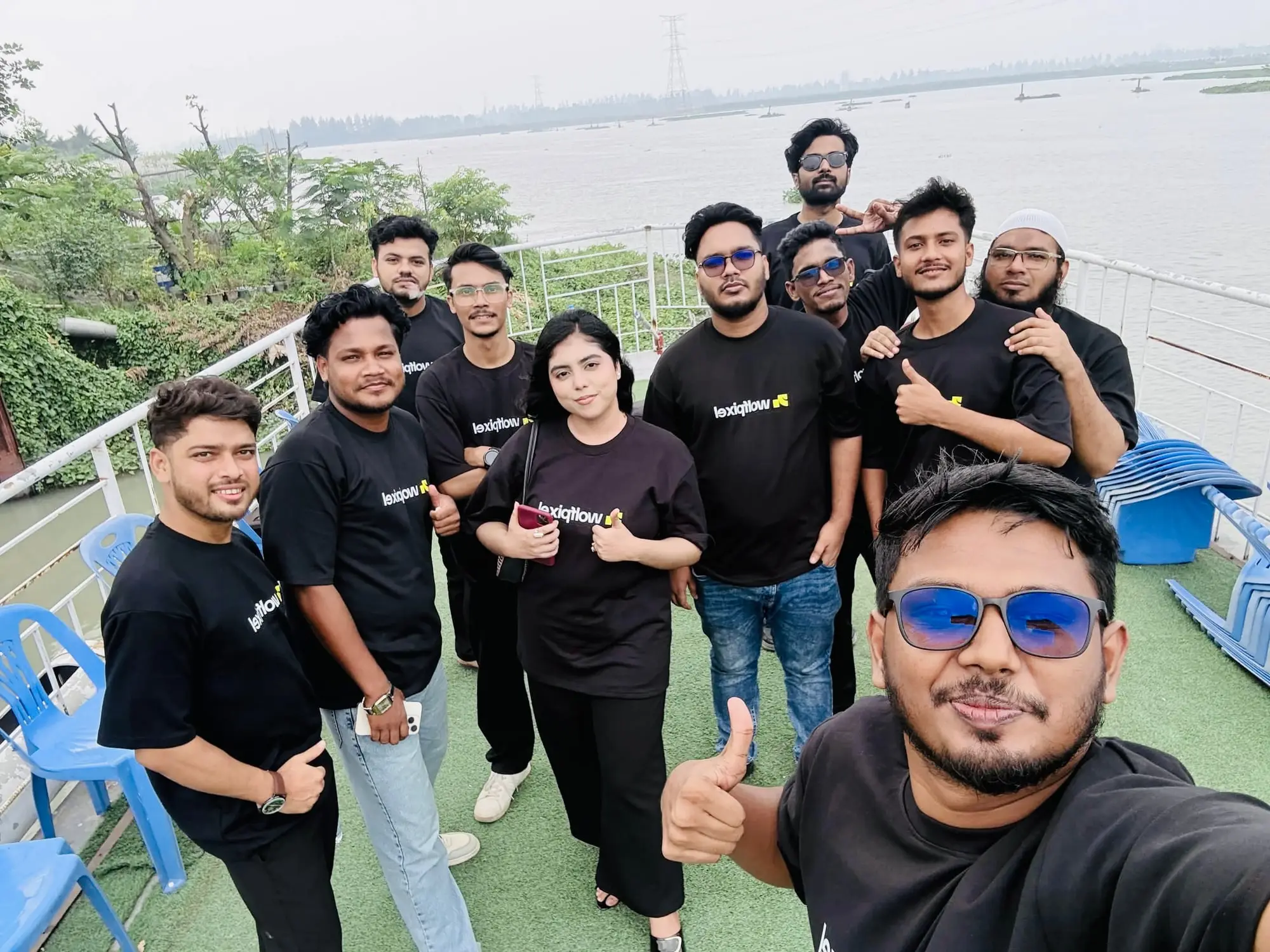 Wolfpixel team selfie by the river on a team trip